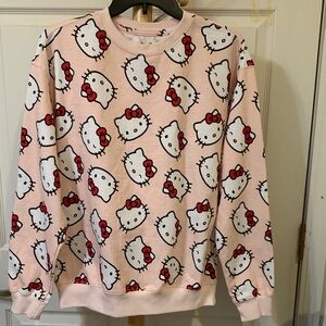 Sanrio’s Hello Kitty Blush Pink Sweatshirt with Red Bows